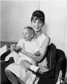  ?? Photograph: Bettmann/Bettmann Archive ?? Hepburn with her son Sean not long after filming Breakfast at Tiffany’s.