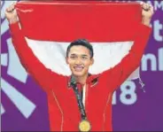  ??  ?? Jonatan Christie in all smiles after winning the final. AFP