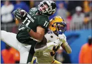  ?? JOHN BAZEMORE — THE ASSOCIATED PRESS ?? Michigan State tight end Connor Heyward (11) makes a touchdown catch against Pittsburgh defensive back Brandon Hill (9) during the second half, Thursday.