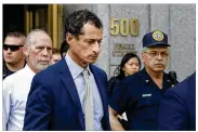  ?? MARK LENNIHAN / AP ?? Former U.S. Rep. Anthony Weiner, 53, leaves federal court Monday in New York. He wept after being sentenced for illicit online contact with a 15-year-old girl.