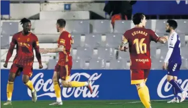  ??  ?? Jair festeja con Vigaray el gol que logró ante el Sabadell (0-1) en el estadio de la Nova Creu Alta.