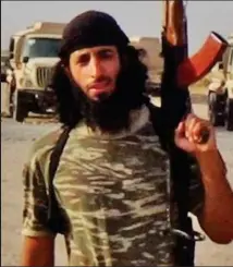  ??  ?? Propaganda: Jihadi John photo posted online by IS