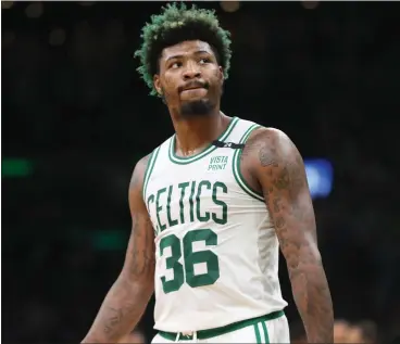  ?? NANCY LANE PHOTOS / BOSTON HERALD FILE ?? Marcus Smart reacts during the second quarter of the Celtics’ win in Game 7 of the Eastern Conference semifinals against the Milwaukee Bucks at TD Garden on Sunday.