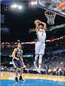  ?? [SARAH PHIPPS/THE OKLAHOMAN] ?? Richard Solomon, going up for a dunk, will sign a 10-day contract with the Thunder. He has spent this season with OKC's G League affiliate, the Oklahoma City Blue.