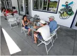  ?? Jason Fochtman / Staff photograph­er ?? Denise and James Fiore enjoy lunch with family at Monty’s Lighthouse Cajun Bar & Grill on May 2 in Montgomery.