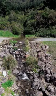  ??  ?? Above and below: Walking across a small stream an option on the Hutt Valley side.