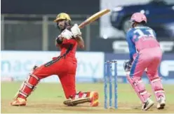  ?? Courtesy: IPL website ?? ↑
Royal Challenger­s Bangalore’s Devdutt Padikkal plays a shot against Rajasthan during their IPL match at the Wankhede Stadium in Mumbai on Thursday.