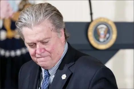  ?? ANDREW HARNIK — THE ASSOCIATED PRESS ?? In this photo taken President Donald Trump’s White House Senior Adviser Steve Bannon arrives for a news conference with President Donald Trump in the East Room of the White House in Washington. Bannon, a forceful but divisive presence in President...