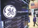  ?? Associated Press file photo ?? General Electric said Thursday it expects to absorb two more years of losses from its GE Capital division based in Norwalk.