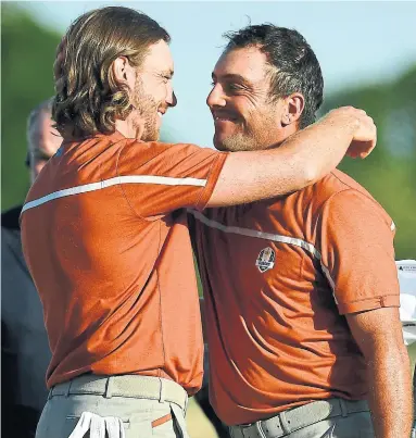  ?? FRANCK FIFE AFP/GETTY IMAGES ?? Tommy Fleetwood, left, and Francesco Molinari became the first European golfers to team up and go 4-0 in fourballs and foursomes at one Ryder Cup. Three of those points came at the expense of Tiger Woods.