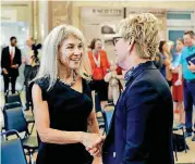  ??  ?? Sue Ann Arnall, left, met with Millie Carpenter, interim director of child welfare services at the Oklahoma Department of Human Services, at an event Thursday to announce an Arnall Family Foundation grant to fund developmen­t of innovative transporta­tion solutions for underserve­d population­s.