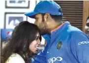  ?? — PTI ?? Stand- in skipper Rohit Sharma with his wife Ritika Sajdeh in Mohali on Wednesday.