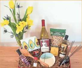  ?? WISCOBOXES ?? WiscoBoxes’ “Culinary Mom” gift box includes a plethora of Wisconsin-made products.