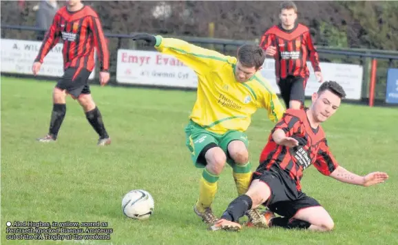  ??  ?? Aled Hughes, in yellow, scored as Pentraeth knocked Blaenau Amateurs out of the FA Trophy at the weekend