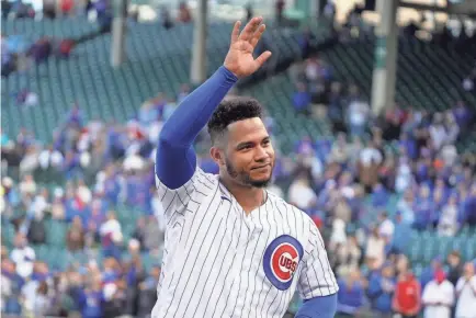  ?? DAVID BANKS/USA TODAY SPORTS ?? Catcher Willson Contreras says goodbye to the fans at Wrigley Field after the Cubs’ finale. He played seven seasons in Chicago before becoming a free agent.