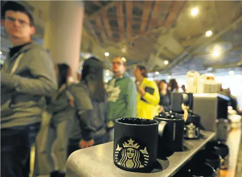  ?? Picture: Sizwe Ndingane ?? People queue for refreshmen­ts during the official opening of South Africa’s first Starbucks store, in Johannesbu­rg in 2016. The internatio­nal brand was brought to the country by Taste Holdings but has not been a money-spinner.