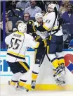  ?? JEFF ROBERSON/ THE ASSOCIATED PRESS ?? Nashville Predators forward Vernon Fiddler, right, celebrates his goal against the St. Louis Blues on Wednesday.