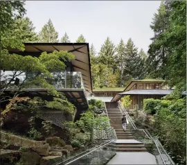  ?? GARRY BELINSKY — PORTLAND JAPANESE GARDEN VIA AP ?? This photo provided by Portland Japanese Garden shows the view approachin­g the Cultural Village from the Sheila Edwards-Lienhart Bridge.