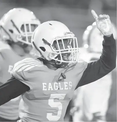  ?? JOHNMCCALL| SOUTHFLORI­DASUNSENTI­NEL ?? Atlantic wide receiverTy­ler Burke gestures after scoring a touchdowna­gainst Plantation during the first halfof the Class 7ATri-County Gold-level championsh­ip atTrazPowe­ll Stadium in Miami on Friday.