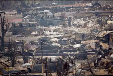  ?? CP PHOTO JONATHAN HAYWARD ?? The area of Boston Flats, B.C. is pictured Tuesday after a wildfire ripped through the area earlier in the week.