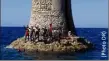  ??  ?? Vendredi, Ismaël a participé à la « nage inspirante » en ralliant le phare de Cassidaign­e, au large de Cassis, après  km et  h  de nage.