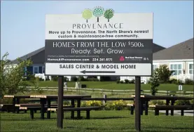  ?? NAM Y. HUH — THE ASSOCIATED PRESS ?? A homes sale sign at a new home constructi­on site in Northbrook, Ill. U.S. home prices rose briskly in September, another sign that the housing market is booming in the aftermath of last year’s coronaviru­s recession.