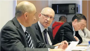  ?? Picture: RAYMOND PRESTON ?? CASH WITHOUT FLASH: CEO Thomas Bärwald, right, and chairman Ian Brander at the Howden AGM, where the company justified the withholdin­g of dividends by saying it needed to maintain ’strategic flexibilit­y’