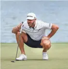  ?? REINHOLD MATAY/USA TODAY SPORTS FILE ?? Dustin Johnson of the 4 Aces lines up his putt on the seventh green during the final round of LIV Golf Miami on April 7 at Trump National Doral.