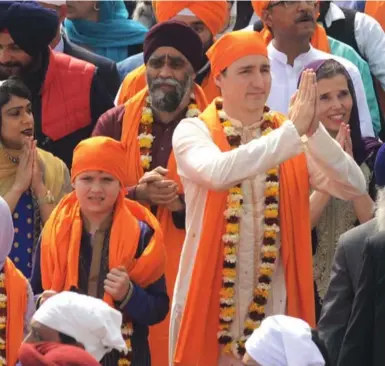  ?? NARINDER NANU/AFP/GETTY IMAGES ?? Media mocked Prime Minister Justin Trudeau for wearing fancy Indian garb more suited to Bollywood, Thomas Walkom writes.