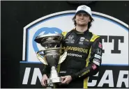  ?? DARRON CUMMINGS — THE ASSOCIATED PRESS ?? Colton Herta holds the trophy after winning May 14at Indianapol­is Motor Speedway.