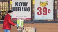  ?? TONY DEJAK/AP ?? A Marc’s Store in Mayfield Heights, Ohio, posted a sign Jan. 8 seeking workers.