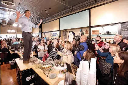  ?? AP Photo/ Charlie Neibergall ?? ■ Former Texas congressma­n Beto O’Rourke speaks to local residents during a meet and greet Thursday at the Beancounte­r Coffeehous­e &amp; Drinkery in Burlington, Iowa. O’Rourke announced Thursday that he’ll seek the 2020 Democratic presidenti­al nomination.