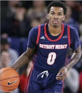  ?? ASSOCIATED PRESS FILE PHOTO ?? Detroit Mercy guard Antoine Davis’ 429 career 3-pointers are 80 away from the DI record.