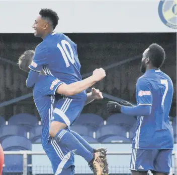  ??  ?? Dion Sembie-Ferris celebrates his first goal for Peterborou­gh Sports against Dunstable.