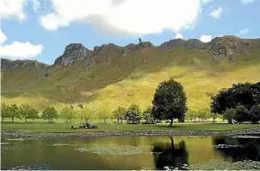  ??  ?? The lake at Craggy Range, with Te Mata Peak in the background, near Havelock North.