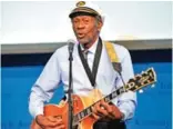  ??  ?? In this Feb 26, 2012 file photo, Chuck Berry plays "Johnny B Goode" at the John F Kennedy Presidenti­al Library and Museum in Boston, an event where he and Leonard Cohen were honored with Awards for Song Lyrics of Literary Excellence.