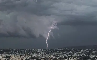  ?? Picture: AFP ?? Lightning strikes over the French Riviera city of Nice yesterday.