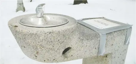  ?? JULIE OLIVER ?? The National Capital Commission recently put in two drinking fountains at Commission­er's Park at Dow's Lake. The fountains, currently protected from the elements under grey boxes, came with a price tag of $205,000 — including $160,000 worth of work on trenches.