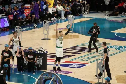  ??  ?? The cameraman in this picture was closer to the basket than Jayson Tatum during his winning shot.