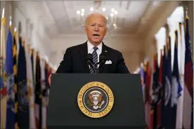  ?? ANDREW HARNIK — THE ASSOCIATED PRESS ?? President Joe Biden speaks about the COVID-19pandemic during a prime-time address from the East Room of the White House, Thursday, in Washington.