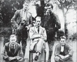  ??  ?? General Lucas (seated) with captors Paddy Brennan, Michael Brennan, James Brennan and Joe Keane.