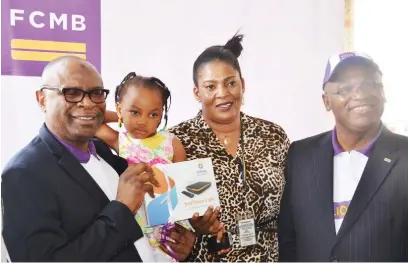  ?? Photo: Abubakar
Yakubu ?? From left: Regional Director Abuja and North, First City Monument Bank, Mr. Lukman Mustapha; Promo winner, Miss. Munachinso Edozie; Manager National Lottery Regulatory Commission, Mrs. Nwokoye Ebele; and Zonal Head FCMB Federal Capital Territory, Mr....