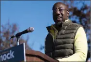  ?? (AP Photo/Ben Gray) ?? Sen. Raphael Warnock, D-Ga., speaks at a rally in Sandy Springs, Ga., on Saturday, Nov. 26, 2022. Georgia counties will be allowed to hold early voting this Saturday in the U.S. Senate runoff election between Warnock and Republican challenger Herschel Walker.
