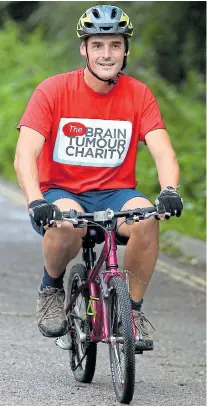  ??  ?? Peter Williams setting off on the tiny bike yesterday