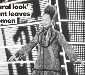  ?? KEVIN MAZUR, WIREIMAGE ?? A “makeup free” Alicia Keys performs Sunday night at the MTV Video Music Awards in New York.