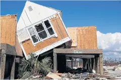  ?? REUTERS ?? Damage to homes and buildings caused by Hurricane Michael is seen in Mexico Beach, Florida yesterday.