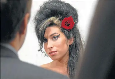  ??  ?? Amy Winehouse at the South Bank Show Awards in 2007 when she won best pop prize for her acclaimed second album Back To Black