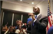  ?? JOE RONDONE — TALLAHASSE­E DEMOCRAT VIA AP ?? Democratic gubernator­ial nominee Andrew Gillum celebrates his victory with supporters during his election watch party at Hotel Duval in Tallahasse­e, Fla., Tuesday.