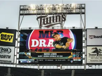  ?? Carlos Gonzalez / Minneapoli­s Star Tribune ?? Royce Lewis is projected on the big screen at Target Field in Minneapoli­s after being selected first overall in the 2017 MLB draft by the Minnesota Twins.