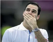  ?? GETTY IMAGES ?? Roger Federer reacts with tears as he watches a surprise video from former Argentine football player Diego Maradona during his South American tennis tour.